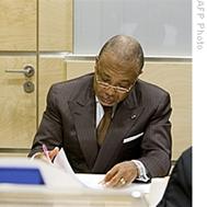 Former Liberian President Charles Taylor sits in the courtroom of the International Criminal Court prior to the beginning of his defense case during his trial in The Hague, 13 Jul 2009