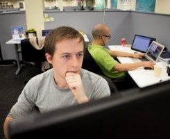 (L-R) Barbie and Zobro working on 37Coins at Plug and Play's offices.